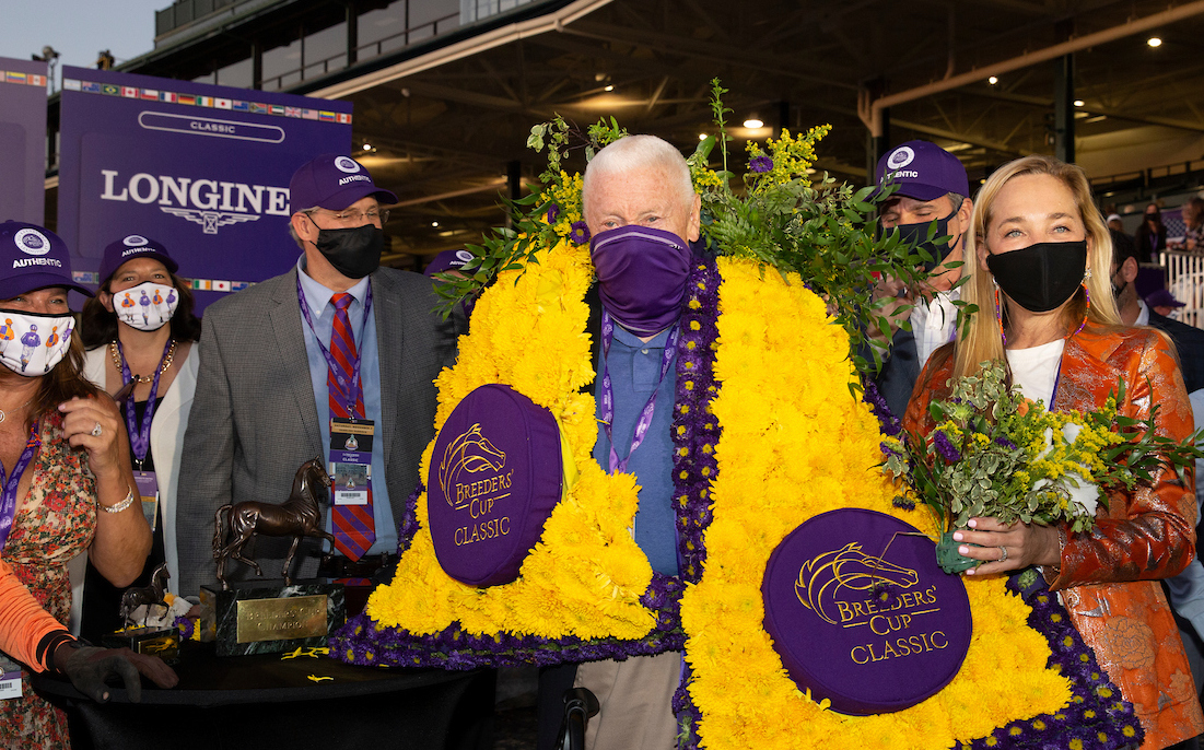 Special moment: Spendthrift owner B Wayne Hughes is draped in the Breeders’ Cup Classic garland alongside wife Patricia after Authentic’s victory at Keeneland last year. Photo: Bill Denver/Eclipse Sportswire/Breeders’ Cup