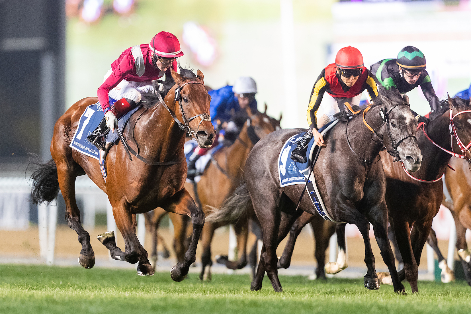 Mile and a half - no problem: Mishriff and Egan (left) get the better of superb Japanese mares Chrono Genesis (centre) and Loves Only You in the G1 Dubai Sheema Classic in March. Photo: Neville Hopwood/Dubai Racing Club