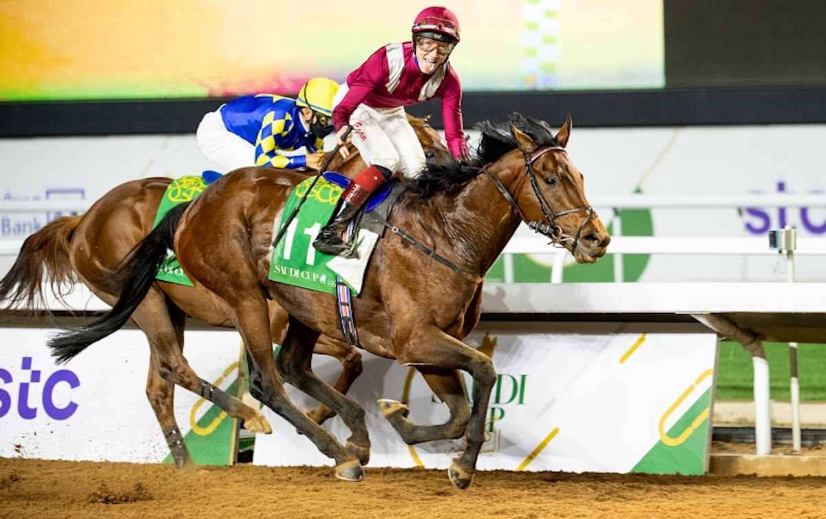 Glorious in Riyadh: jockey David Egan is celebrating already as Mishriff crosses the line to win the Saudi Cup in 2021. Photo: Douglas DeFelice/Jockey Club of Saudi Arabia