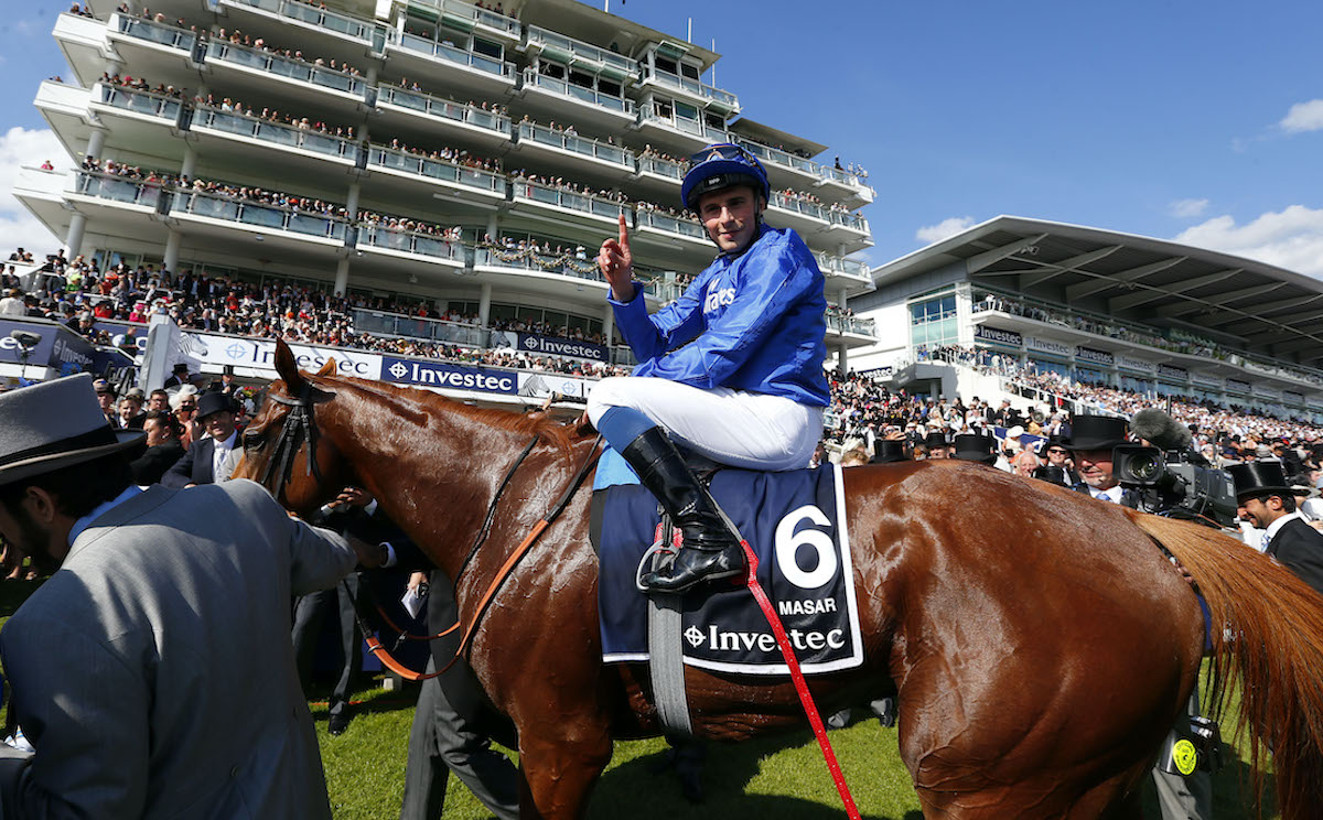 William Buick celebrates at Epsom following Masar's Derby triumph. Photo: Dan Abraham / focusonracing.com