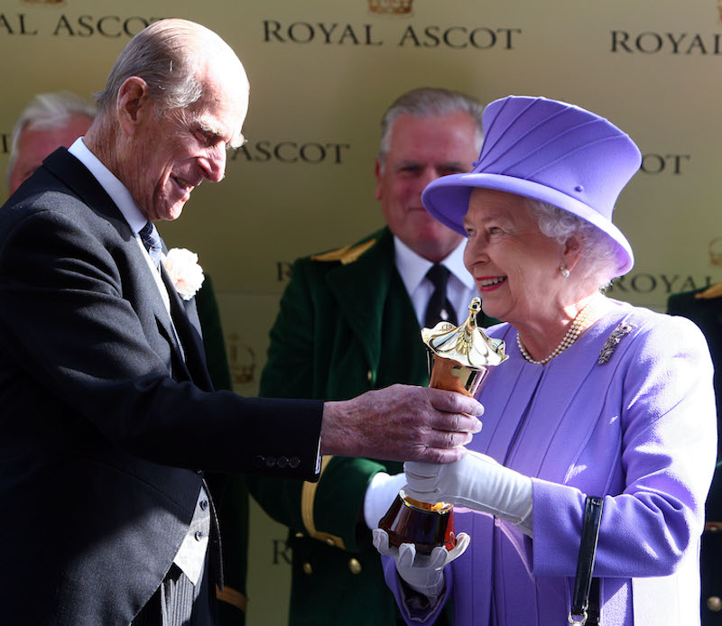 The Duke of Edinburgh presents the Queen with the Queen's Vase after Estimate’s victory in 2012. Photo: Dan Abraham / focusonracing.com