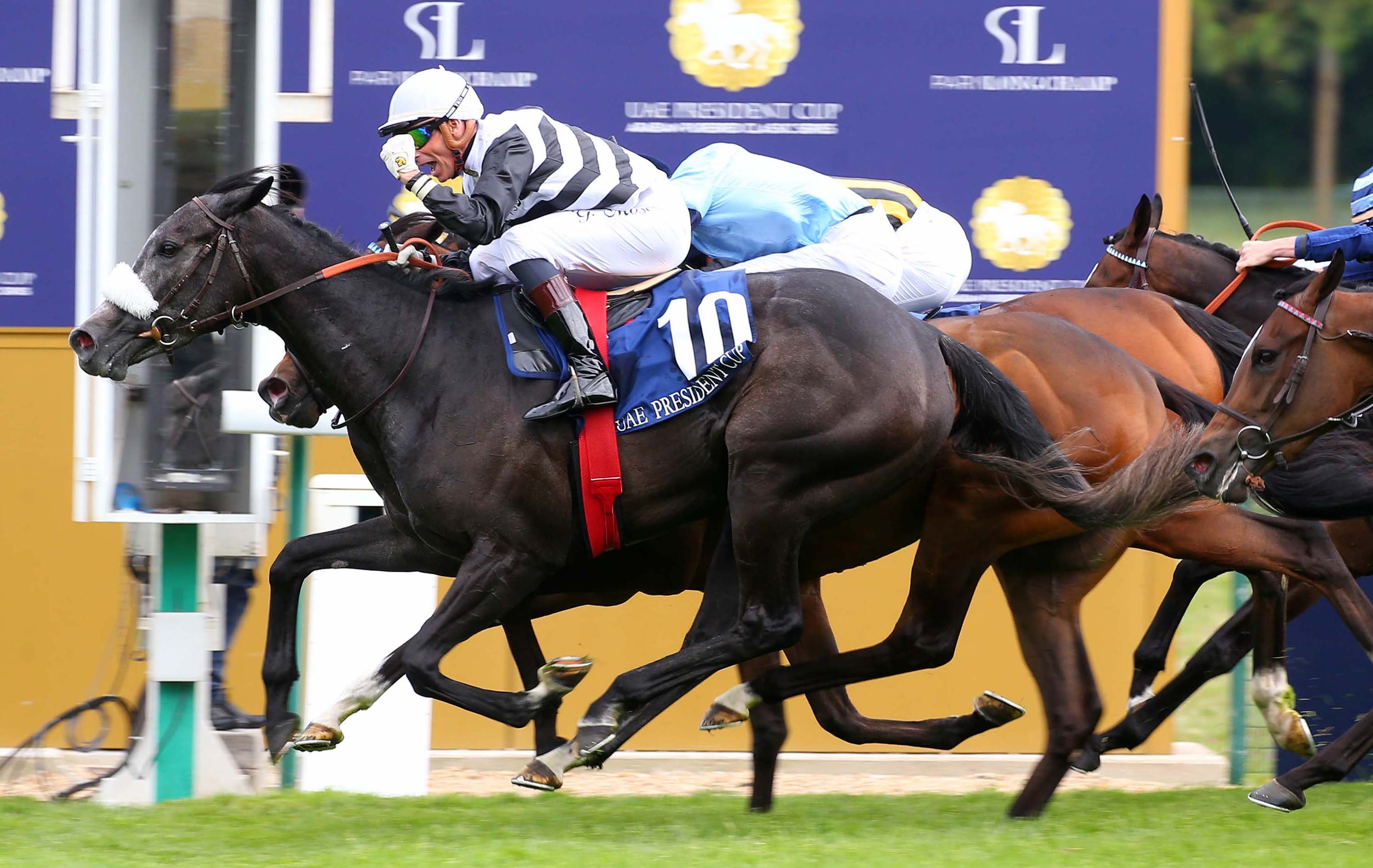 Bravo! Gerald Mossé with a clenched-fist salute as he brings Mangoustine to nab 1000 Guineas winner Cachet on the line in the Poule d’Essai des Pouliches. Photo: Dyga/focusonracing.com