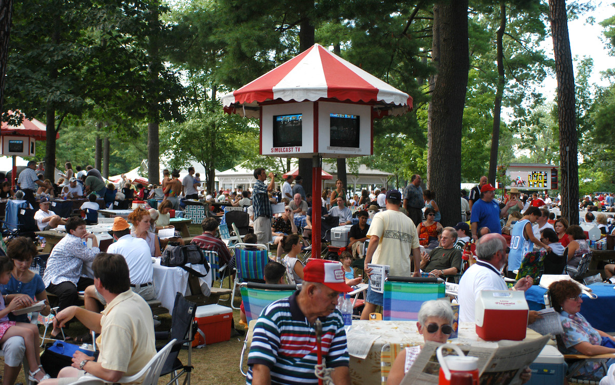 Saratoga’s wooded backlot hosts a massive daily picnic during the celebrated summer meet. Photo: NYRA / Coglianese