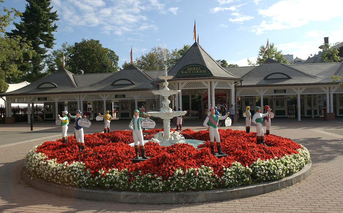 Lawn jockeys depicting Travers Stakes winners on show just inside the gate at Saratoga, a place where history matters. Photo: NYRA / Coglianese