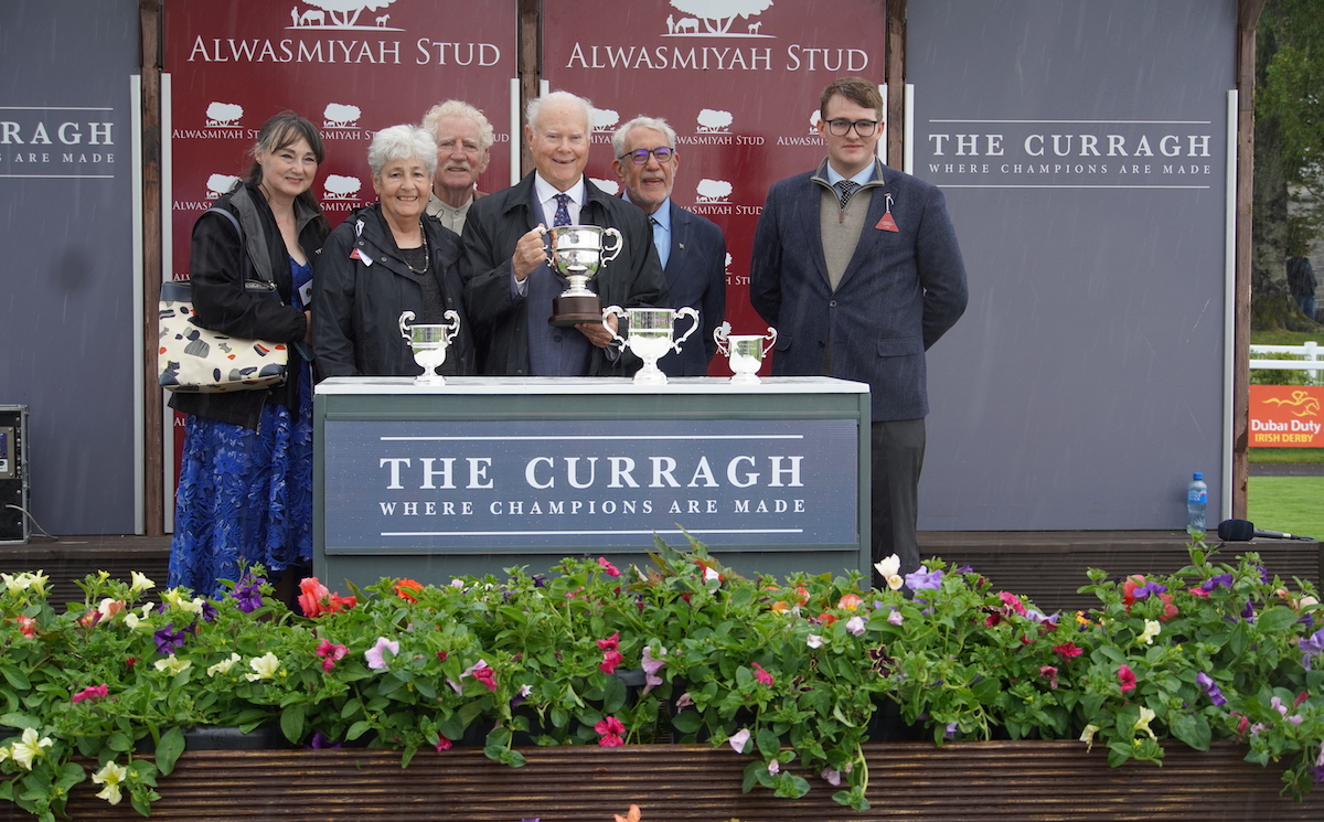 Timely triumph: Team Valor principal Barry Irwin holds the trophy after La Petite Coco’s G1 success in the Pretty Polly Stakes; two of the partners in the filly, Arlene Wilkins and Nick Ben-Meir, were on hand at the Curragh. Photo supplied
