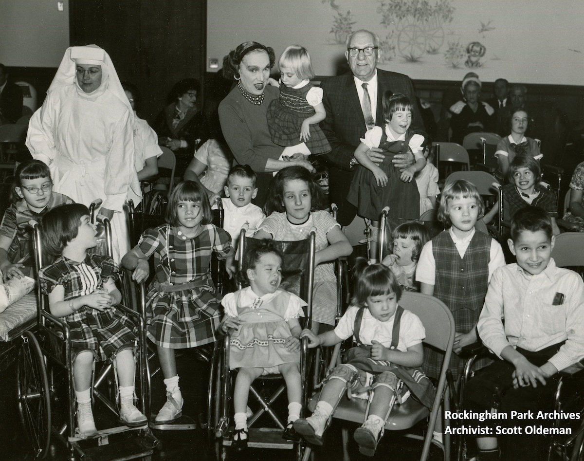 Father figure: Lou Smith and his wife Lutza at one of the many children’s charity events during a four-decade tenure at the helm. Photo: Rockingham Park Archives/Archivist Scott Oldeman