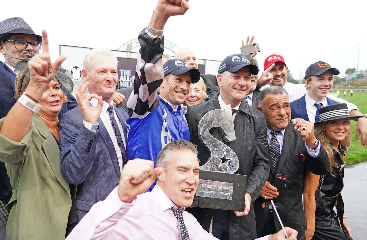 All-Star success: syndicate members celebrate with jockey Hugh Bowman after a lucrative success from Mugatoo in last year’s All-Star Mile at Moonee Valley. Photo: Australian Bloodstock