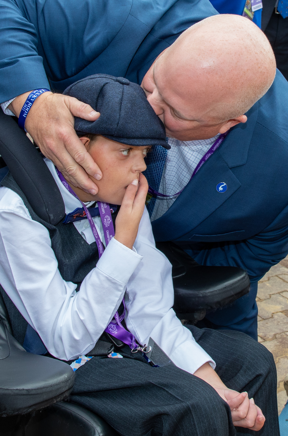 A kiss from pop: Cody Dorman and father Kelly after Cody’s Wish scores at Keeneland. Photo: Bill Denver/Eclipse Sportswire/Breeders’ Cup