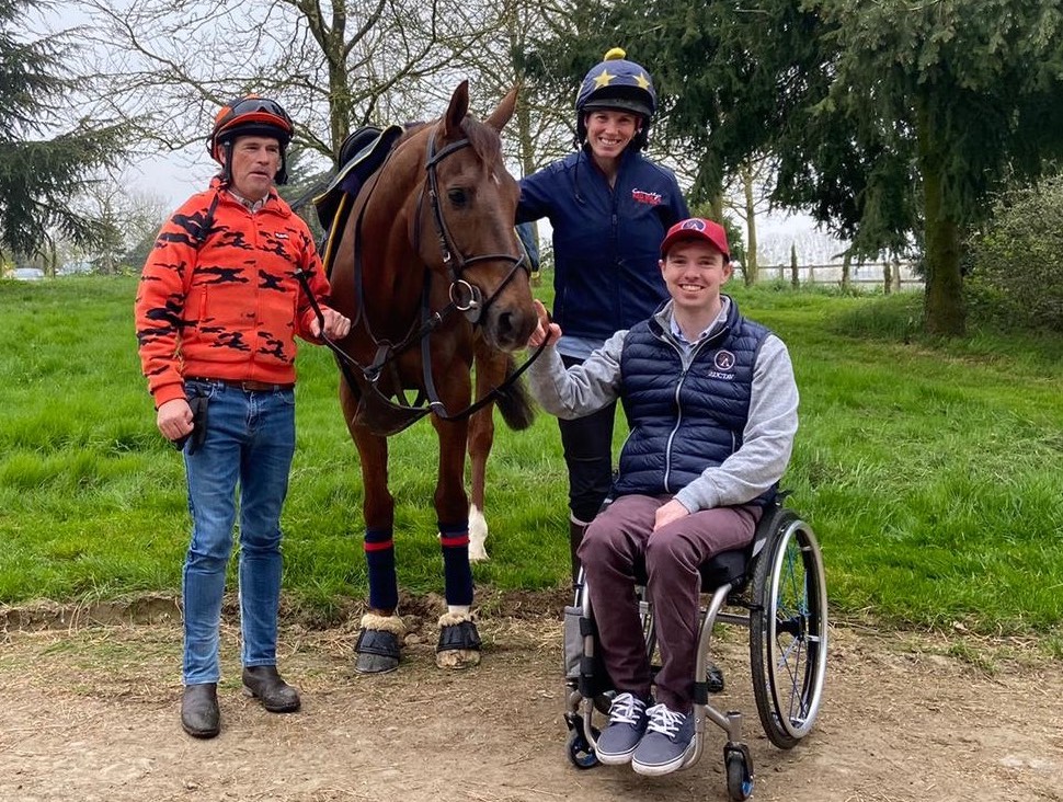 Jacob Pritchard Webb with Louisa and Philip Carberry and their stable star, dual Grand-Steeple Chase winner Docteur De Ballon. Photo supplied
