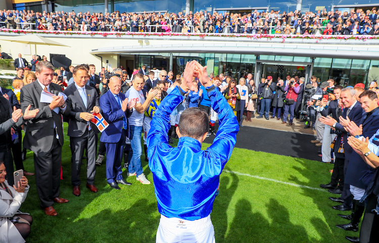 Champion jockey: William Buick receives the applause of the crowd and fellow racing professionals at Ascot before being crowned champion jockey. Photo: Mark Cranham / focusonracing.com