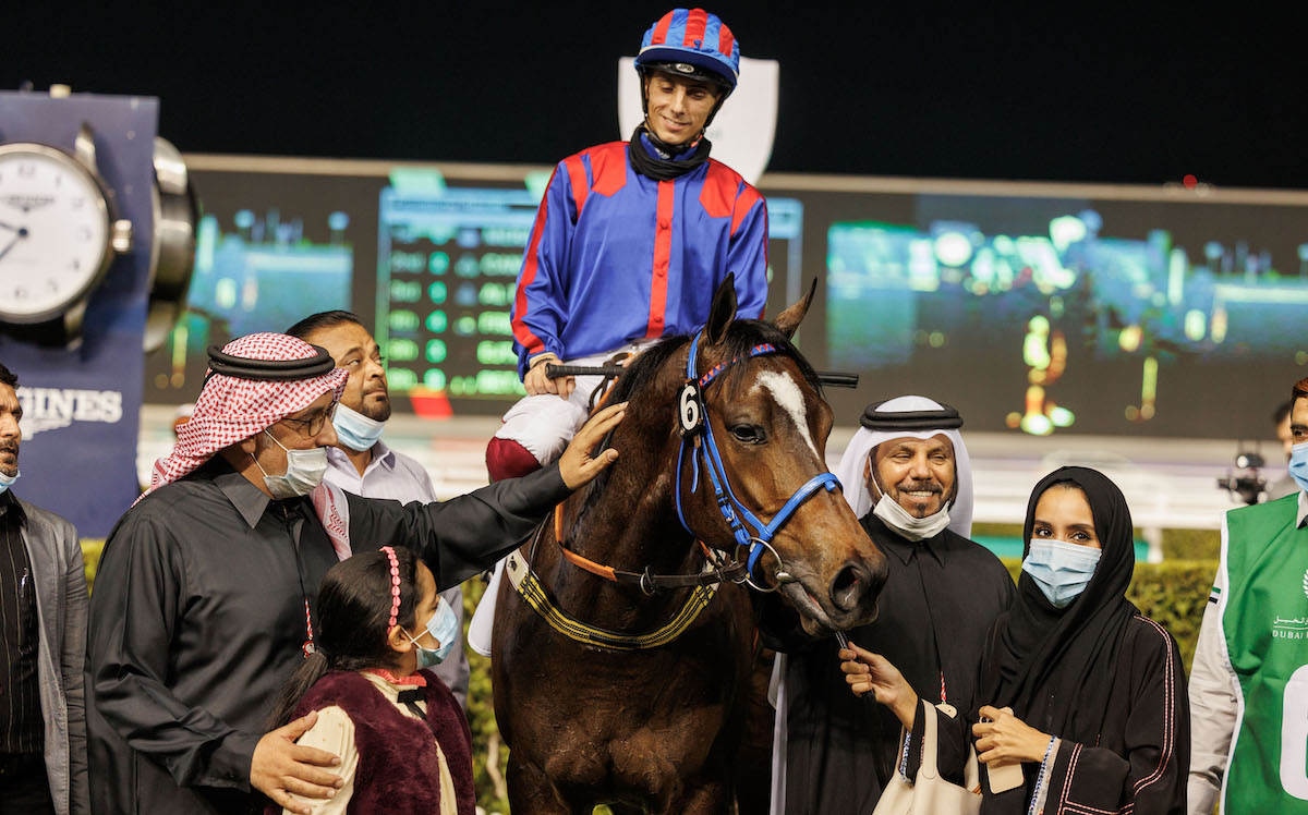 Success as an owner: Maitha Alsuwaida (right) poses for post-race photographs Meraas (Antonio Fresu) after the G3 Al Shindagha Sprint at last year’s Dubai World Cup Carnival. Photo: Dubai Racing Club