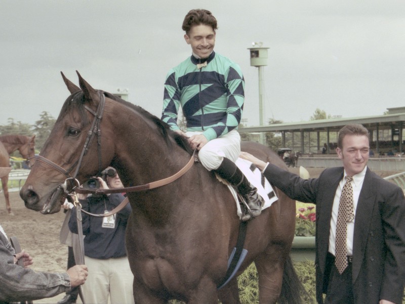 Jose Valdivia and Tim Pinfield are all smiles posing with victorious Big Jag after the 1999 Potrero Grande Handicap at Santa Anita. Photo: Benoit photo