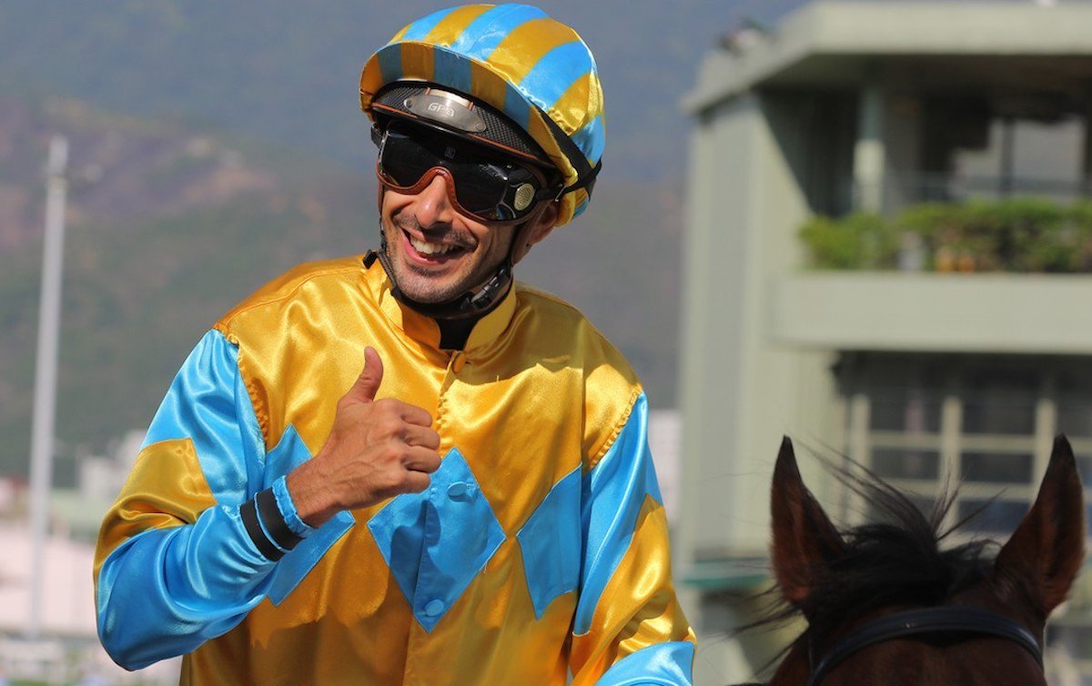 Thumbs up: much travelled jockey Alberto Sanna enjoyed lucrative successes in Qatar and Saudi Arabia last month. Photo: HKJC