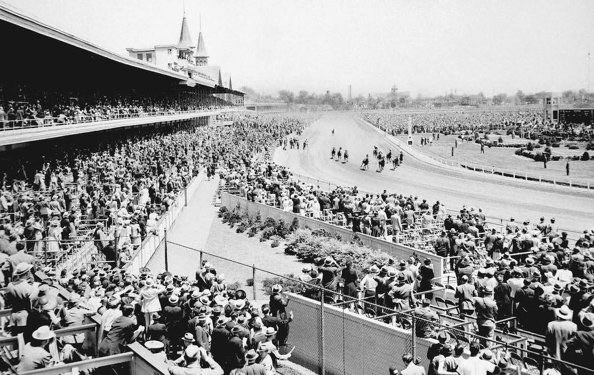 Racing beneath the iconic Twin Spires which first rose above Churchill Downs in 1895. Photo: Keeneland Library Cook Collection