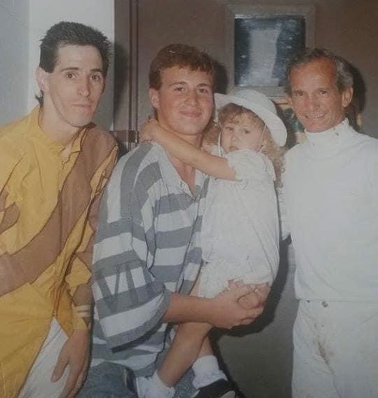 Babe in arms: an infant Dana Saul held by cousin Tim Pettine, with her dad (left) and Bill Shoemaker (right)