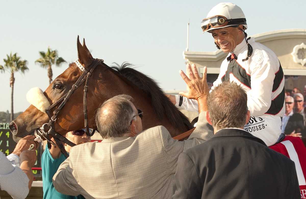 Bill Spawr greets stable star Amazombie and Mike Smith after they take the Bing Crosby at Del Mar in July 2012. (Benoit photo)