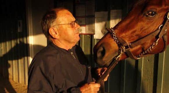 Amazombie and his owner-trainer have a quiet moment at the barn between major stakes wins. (Benoit photo)