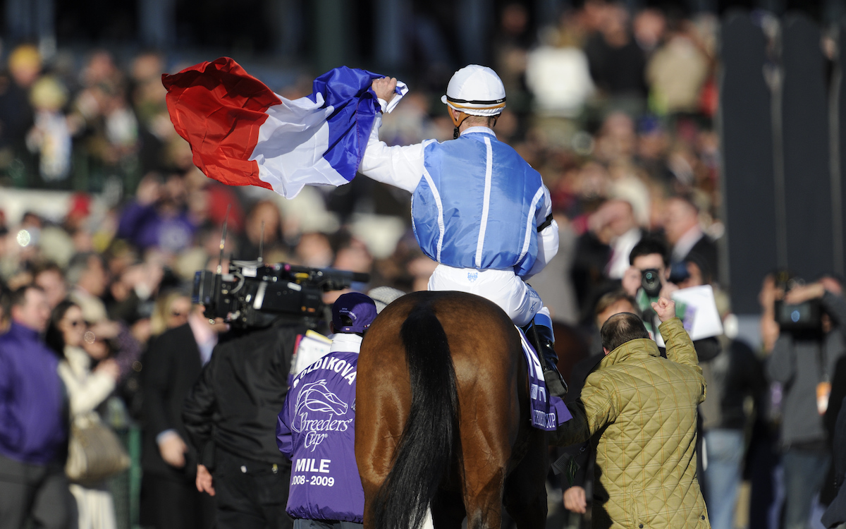 Flying the flag: Goldikova and Olivier Peslier after completing an unprecedented Breeders’ Cup Mile hat-trick at Churchill Downs in 2010. Photo: Breeders' Cup/Todd Anderson