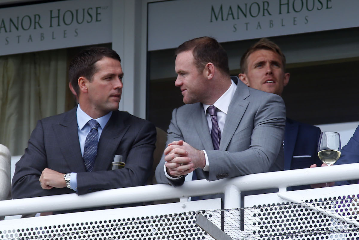 Old pals’ act: Wayne Rooney (right) enjoys a day at the races with his former England teammate. Photo: Dan Abraham/focusonracing.com