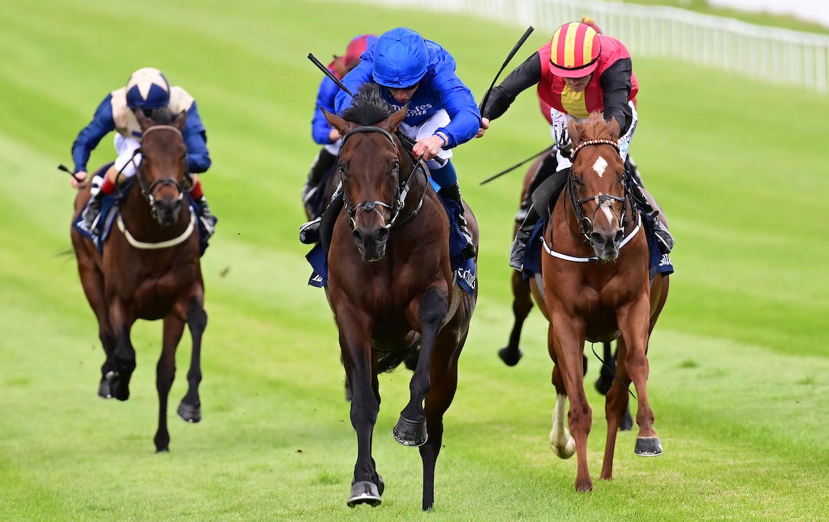 Classic imprimatur: Goresbridge graduate New Energy (striped cap, right) is runner-up to Native Trail in the Irish 2,000 Guineas. Photo: Healy / focusonracing.com