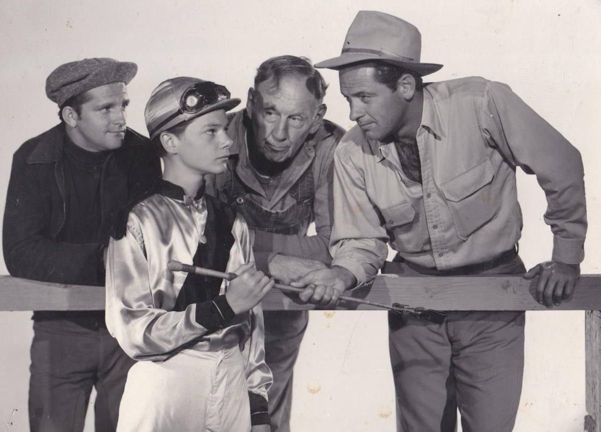 Stanley Clements (left) and Basil Ruysdael huddle with Malone and the kid. Photo: Columbia Studios