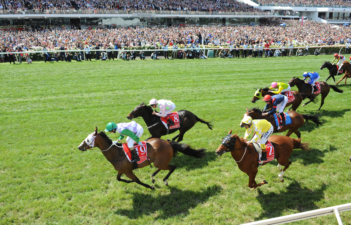 History maker: Michelle Payne wins the Melbourne Cup on Prince Of Penzance at Flemington in 2015. Photo: VRC / Racing Photos