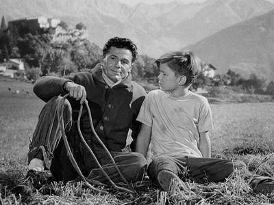 John Garfield and Orley Lindgren as flawed father and loyal son. (20th Century Fox photo)