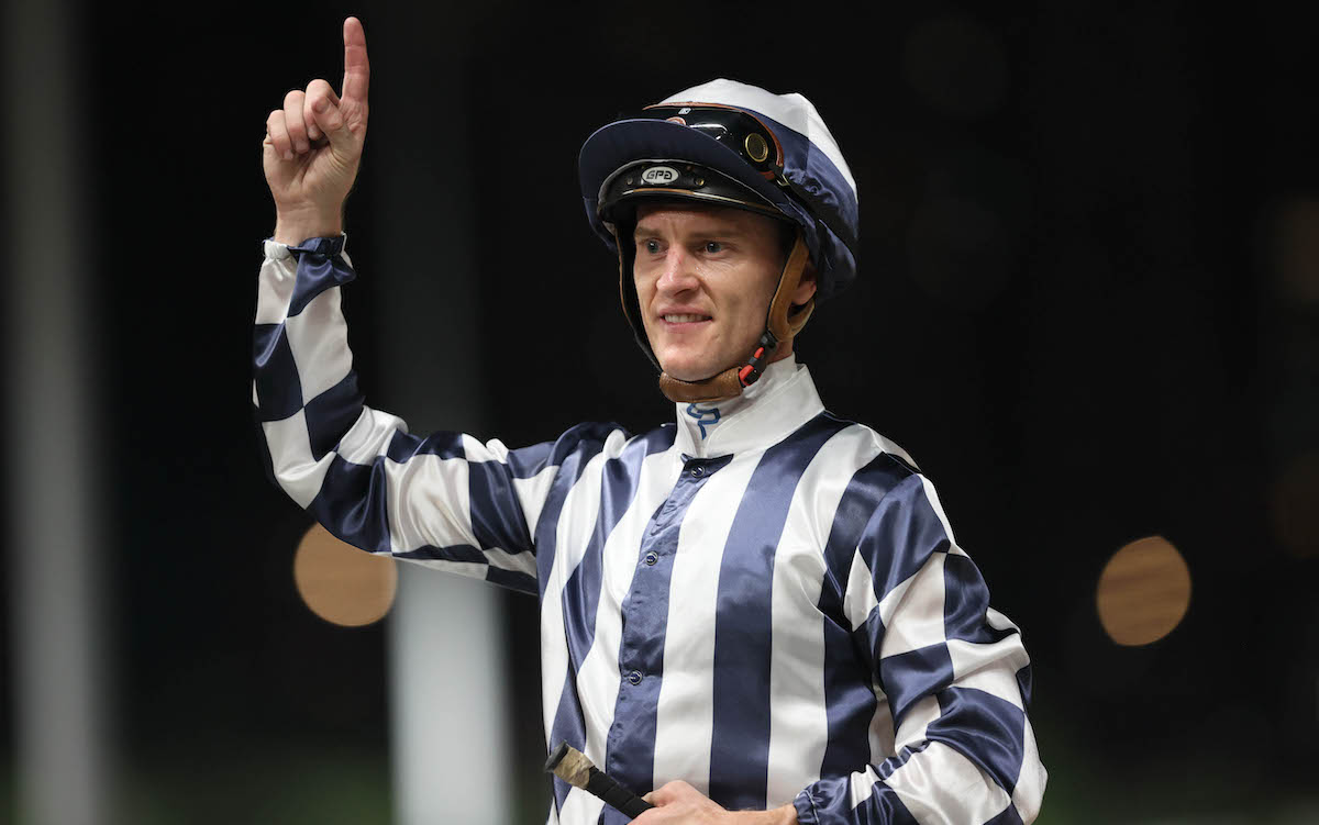 In prolific form: Zac Purton celebrates another treble at Happy Valley on July 11. Photo: HKJC