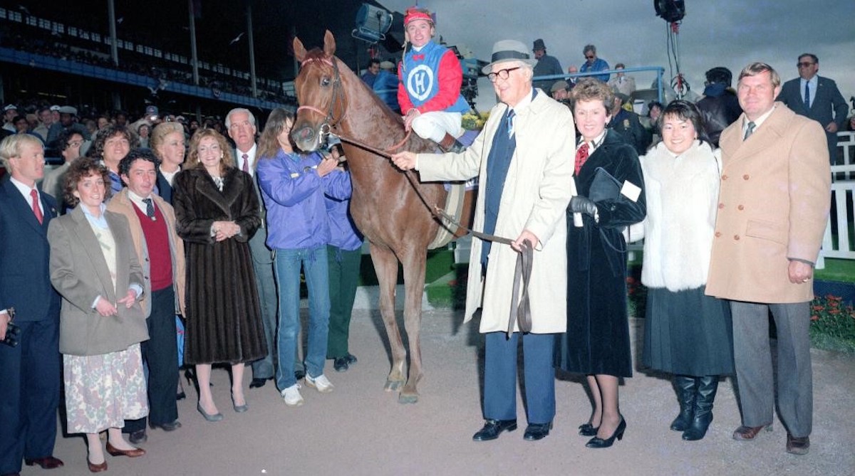 Ross and Nancy Fenstermaker (far right) and Fred and Wanda Hooper (next to horse) were the leading lights among those in the winner's circle after Precisionist wins the Breeders' Cup Sprint. (Coglianese Photos)