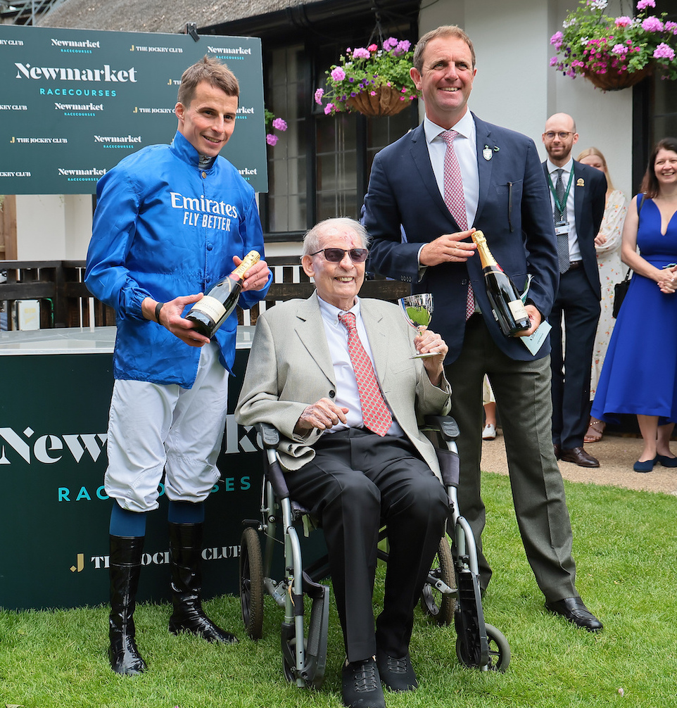 Clive Brittain (centre) presents trophies to jockey William Buick and trainer Charlie Appleby after the race run in honour of his late wife Maureen at Newmarket in June 2023. Photo: Mark Cranham/focusonracing.com