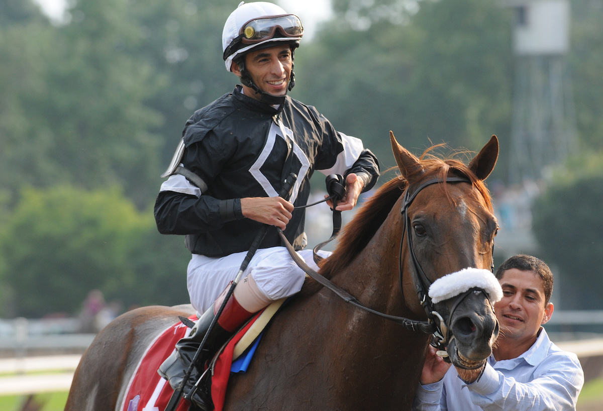 John Velazquez and groom Gustavo Sanchez get ready to enter another winner's circle with Commentator. Photo: Coglianese