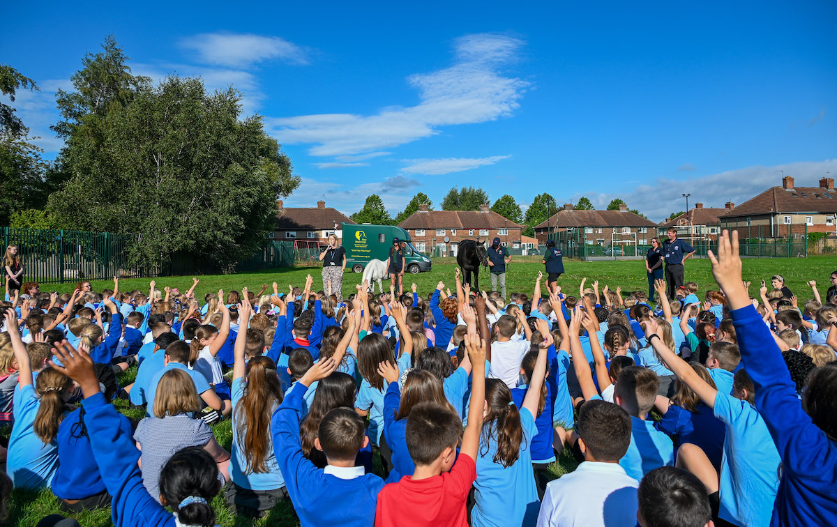 Remy and Poppy join morning assembly at school. Photo: York Racecourse