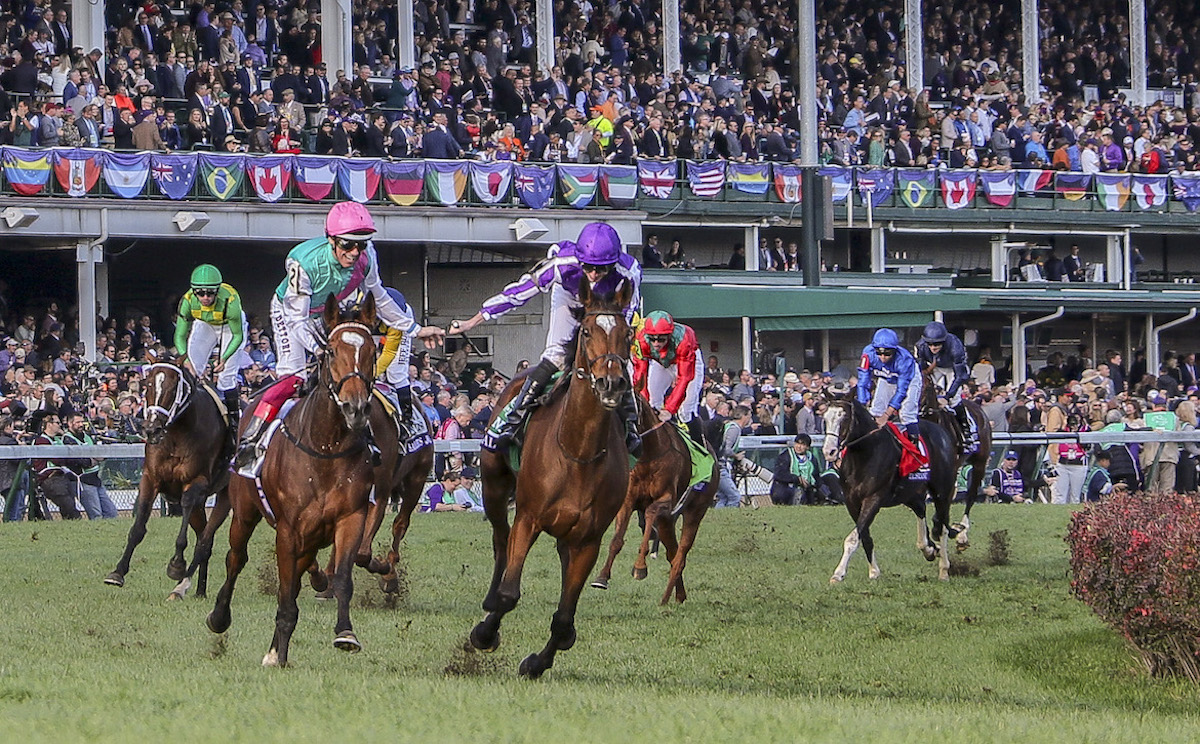 Well done: Ryan Moore (right) acknowledges Frankie Dettori after Enable outdoes Magical at Churchill Downs. Photo: Mary Meek / Eclipse Sportswire / CSM / Breeders Cup