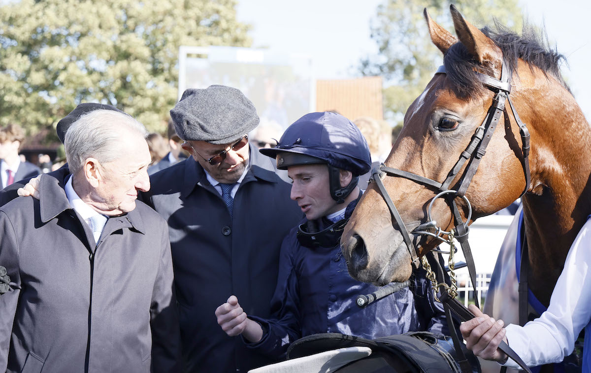 Post-race debrief: City Of Troy and Ryan Moore with for co-owners Derrick Smith and Michael Tabor after the Dewhurst Stakes. Photo: Dan Abraham / focusonracing.com