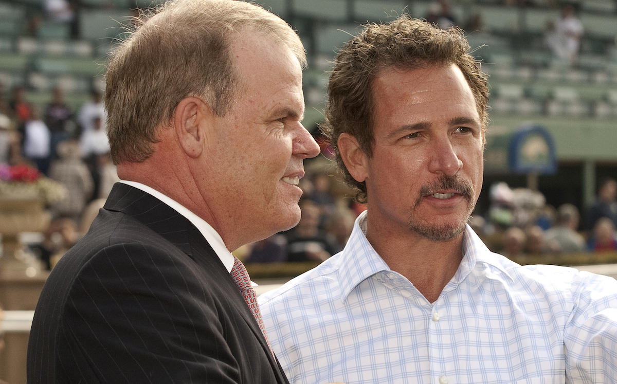 Trainer Mike Puype and Jim Rome admire Mizdirection after one of her performances. (Benoit photo)