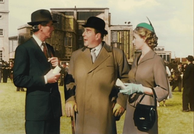 Edward Underdown, Robert Morley and Honor Blackman gather in a parade ring. (Ealing Studios photo)