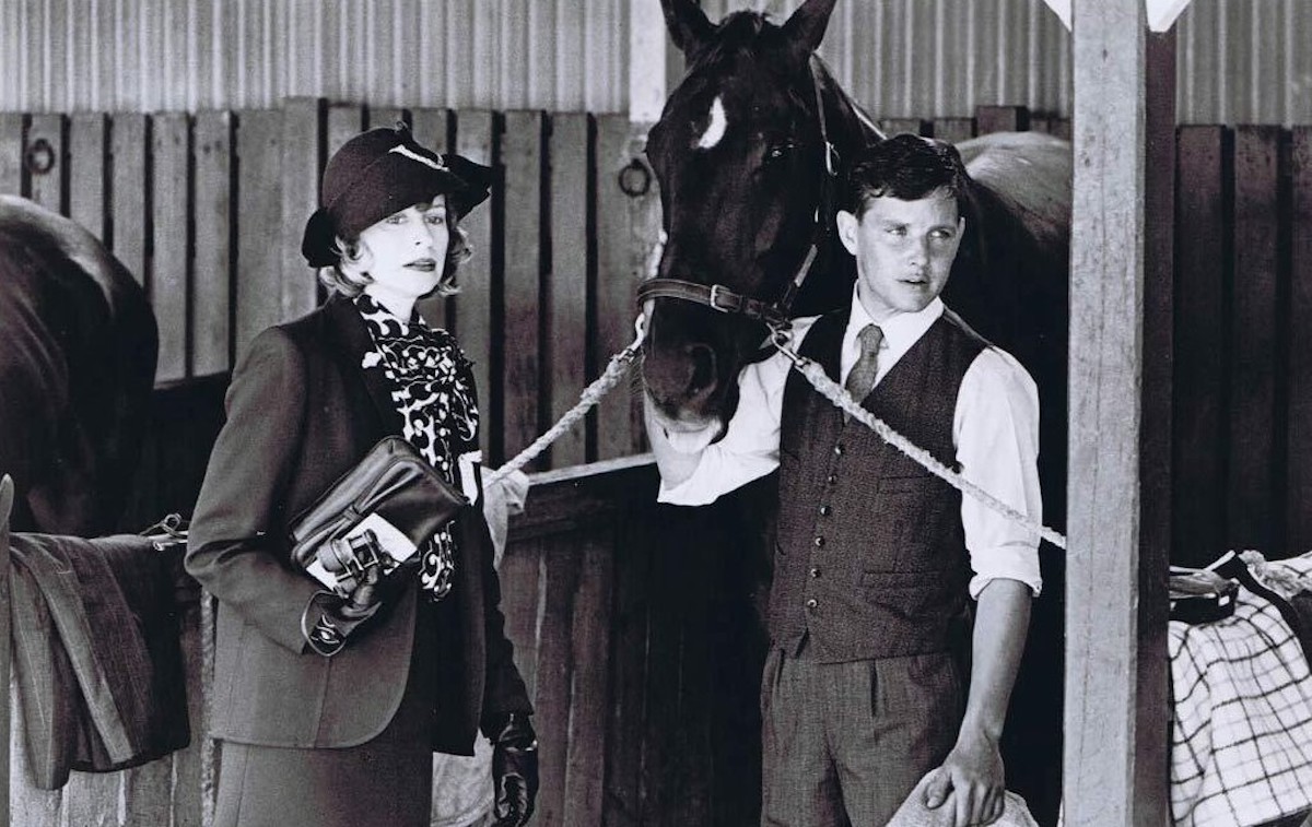 Judy Morris and Tom Burlinson with their movie Phar Lap, Towering Inferno. (20th Century Fox photo)