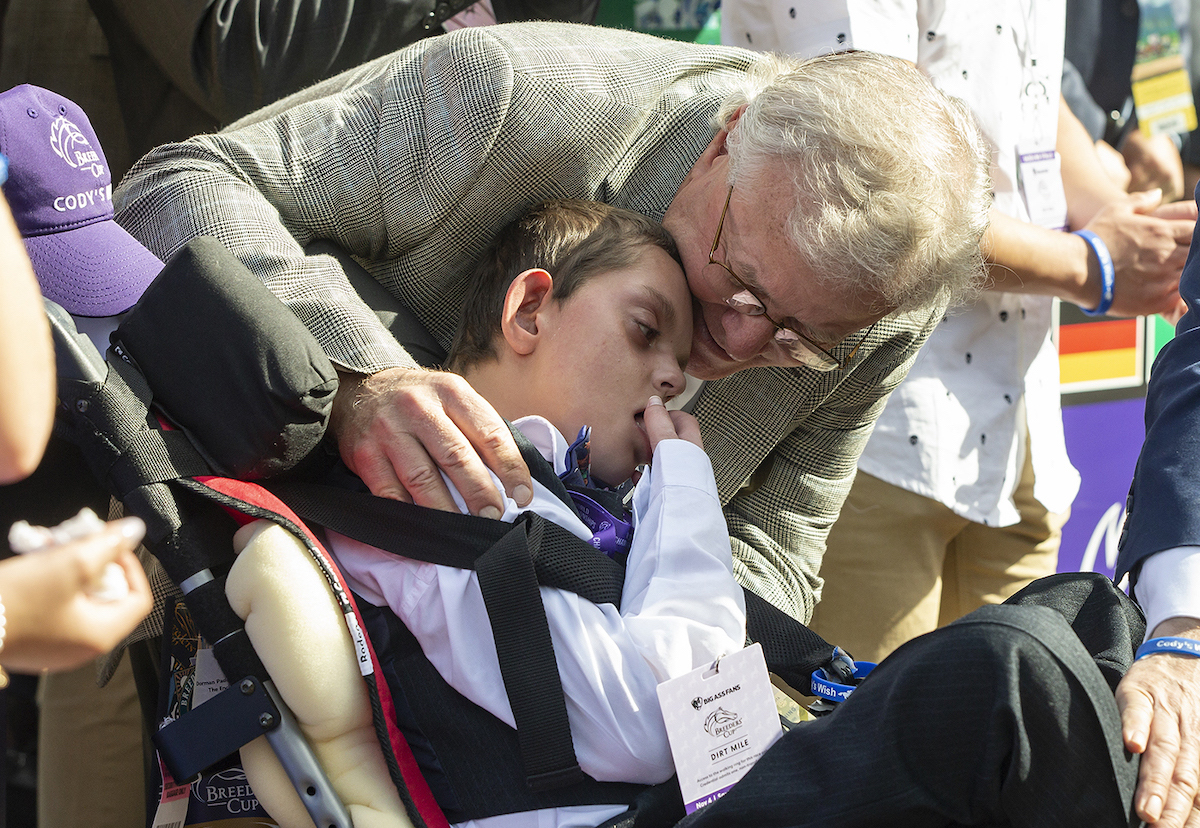 Bill Mott, trainer of Cody’s Wish, with Cody Dorman at the Breeders’ Cup. Photo: Benoit