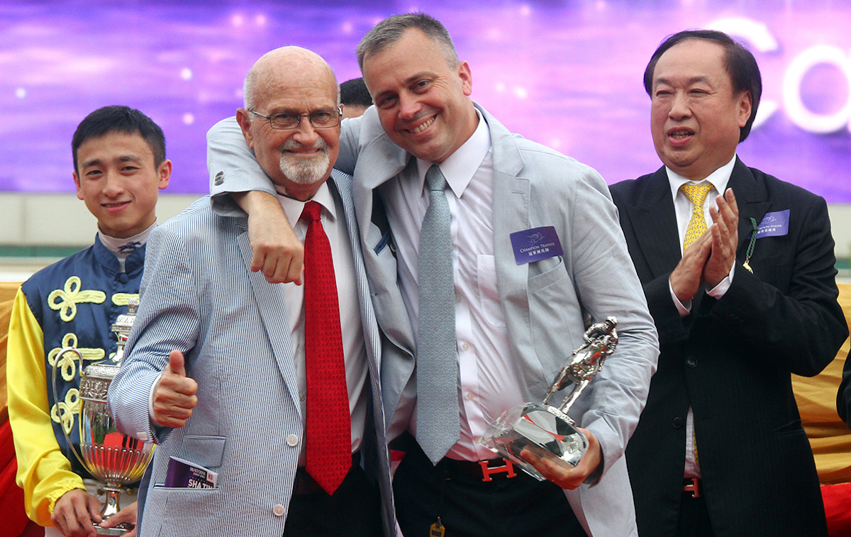 Caspar Fownes celebrates a trainers’ title with his late father Lawrie. Photo: HKJC