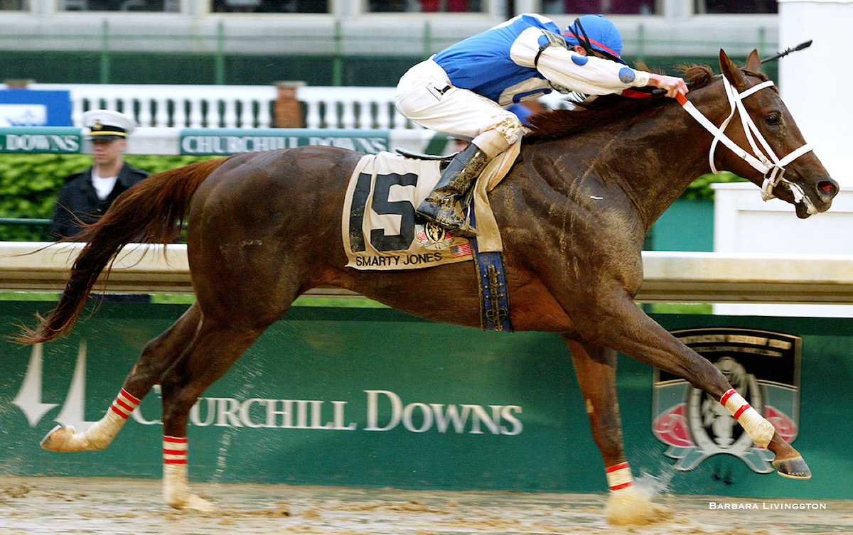 Smarty Jones powers through the wire to win a muddy running of the 130th Kentucky Derby. Photo: Barbara Livingston