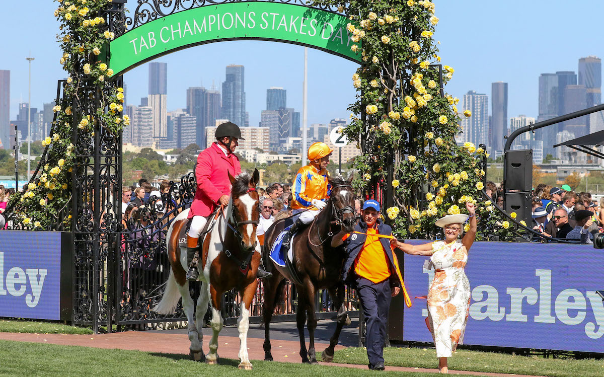 An elated Opie Bosson and Kayrn Fenton-Ellis return to scale with Imperatriz after her victory in the G1 Darley Champions Sprint at Flemington in November 2023. Photo: Bruno Cannatelli