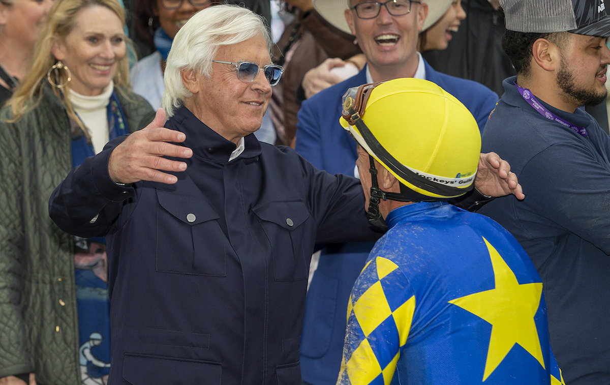 Time for a hug: Bob Baffert greets Dettori after Newgate’s victory. Photo: Benoit