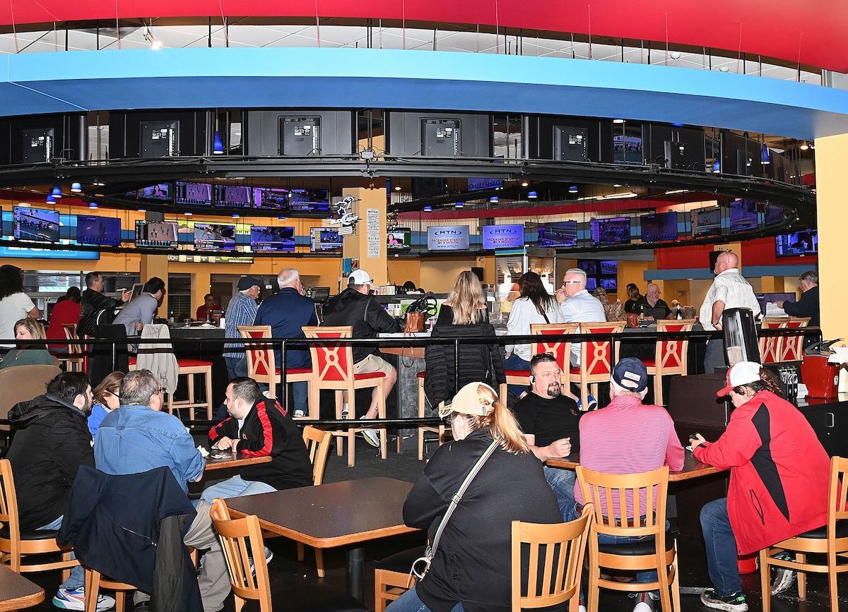 A bet and a beer: typical scene in the betting bar at Sam Houston, one of two main Thoroughbred venues in Texas. Photo: Coady Photography