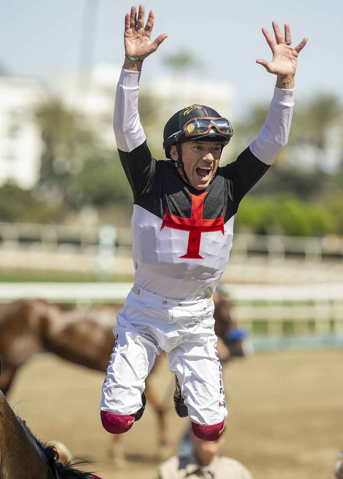 Crowd pleaser: Frankie Dettori with a flying dismount after landing Santa Anita Oaks. Photo: Benoit