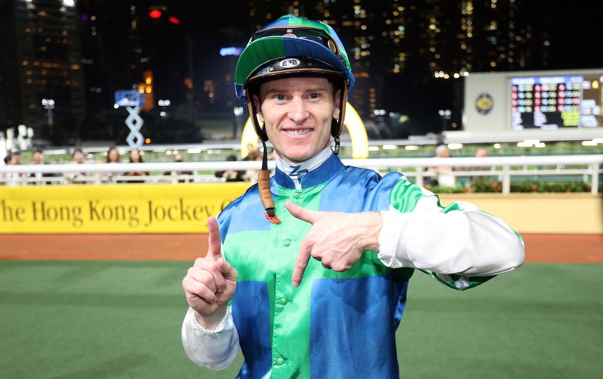 Zac Purton celebrates after 1,700th HK winner at Sha Tin. Photo: HKJC