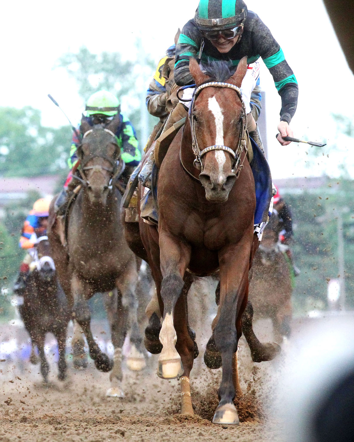 Hugging the rails: Brian Hernandez and Mystik Dan claim the 150th Kentucky Derby. Photo: Churchill Downs / John Gallagher