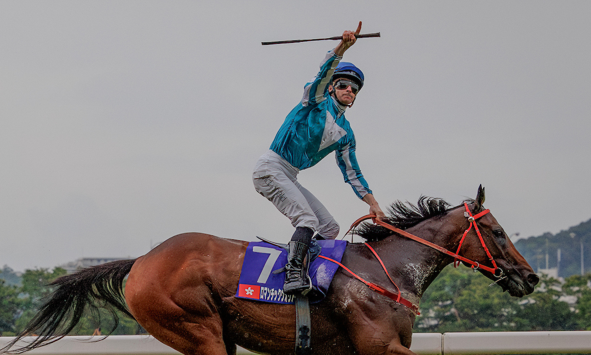 World leaders: James McDonald celebrates as Romantic Warrior wins Yasuda Kinen in Japan. Photo: HKJC