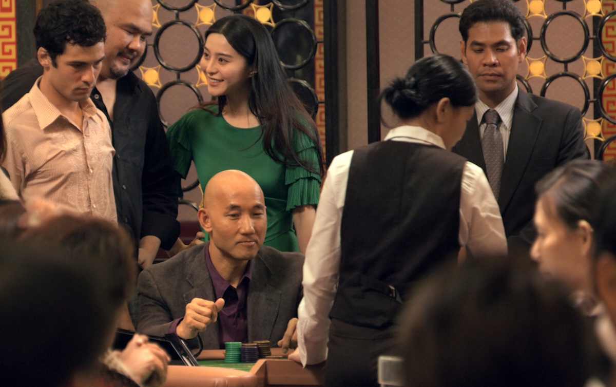 The Macau casino scene looms over the racing action in Stretch. (MK2 Productions)