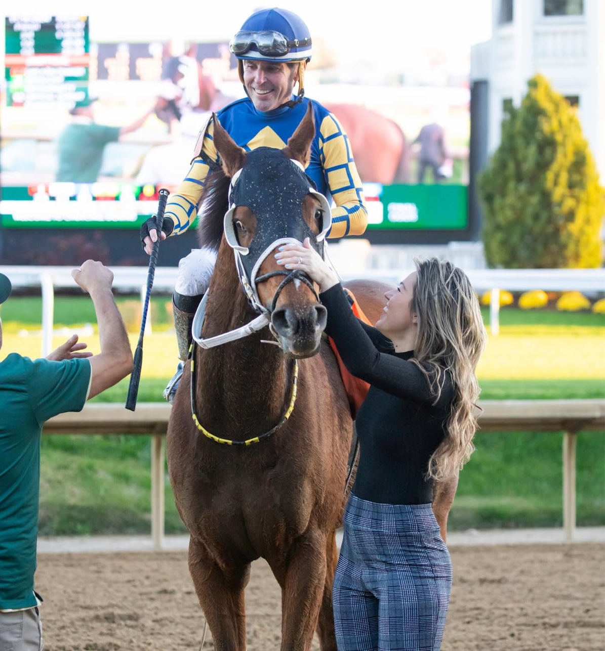 Trainer Brittany Vanden Berg and her husband, jockey Chris Emigh, after Like A Saltshaker is declared the winner of the Claiming Crown Rapid Transit. Photo: Gwen Davis / Davis Innovation