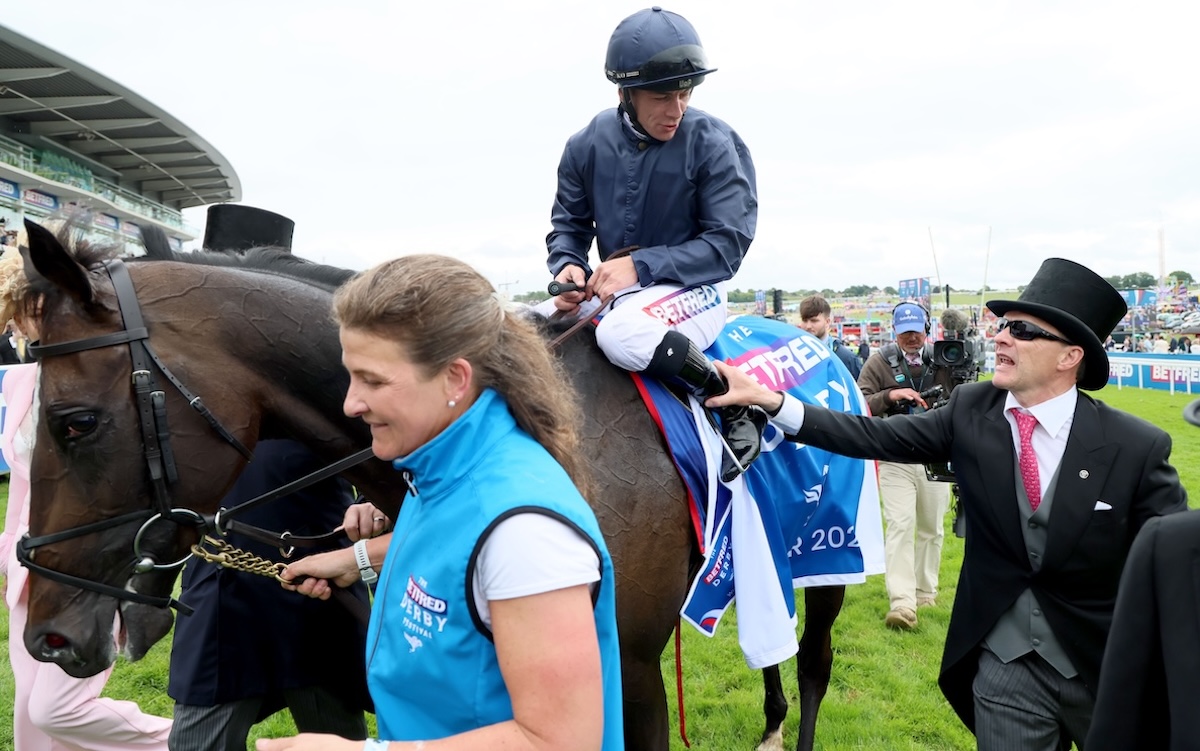 Derby heroes: Aidan O'Brien greets Lambourn and Wayne Lordan at Epsom. Photo: Dan Abraham / focusonracing.com